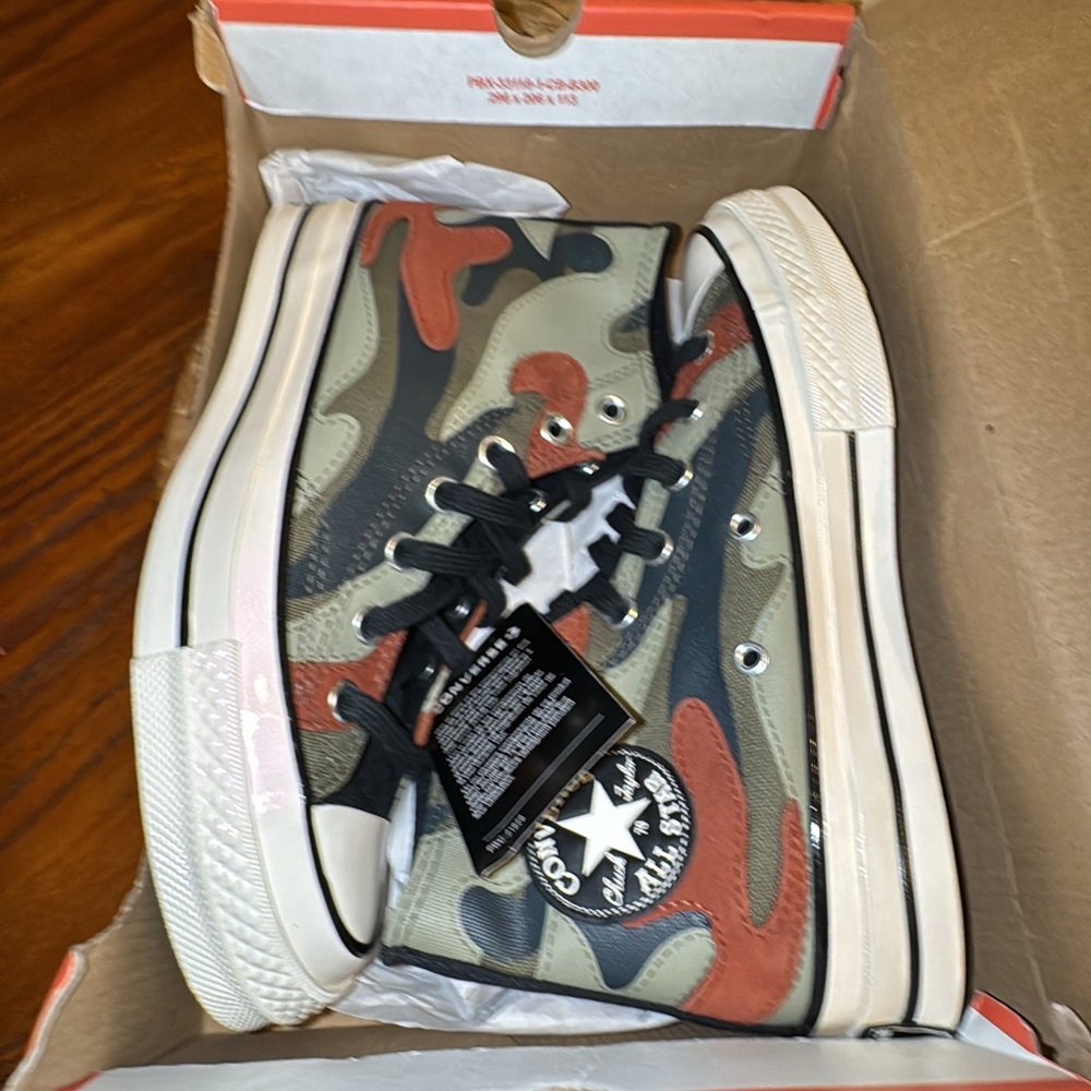 Converse All Stars
Camo Chuck Taylor
 70 High tops “Field surplus” size 7.5